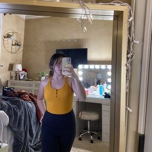 yellow bodysuit